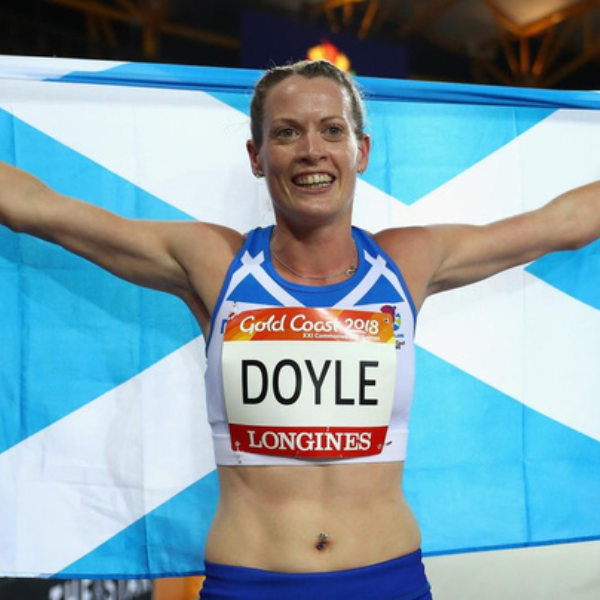 Eilidh Doyle holding the saltire  flag 